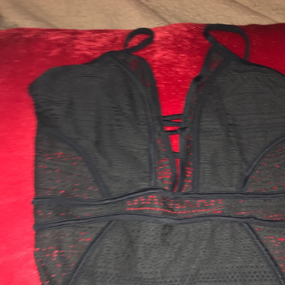 New with tags Black open back one piece swimsuit